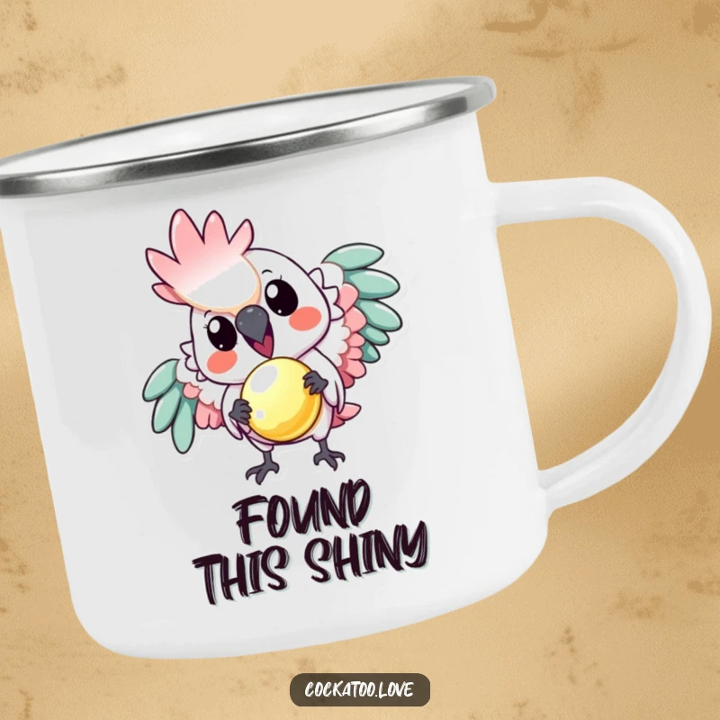 Funny camping mug: A playful cockatoo offers a tiny, shiny object, perfect for humorous outdoor adventures and coffee lovers.