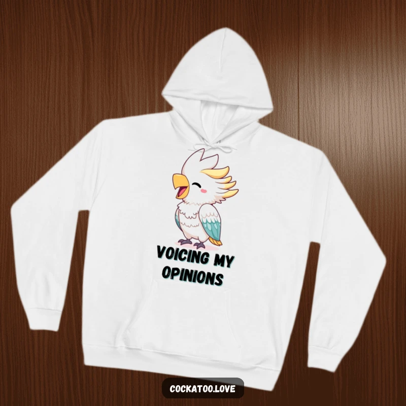 Funny cockatoo hoodie featuring a cheerful bird with a bright beak squawking with delight, radiating infectious happiness and spirited energy.