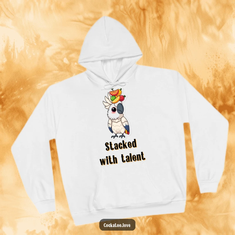 Determined cockatoo hoodie featuring a bird intently balancing a colorful stack of fruits on its head, a symbol of focus.