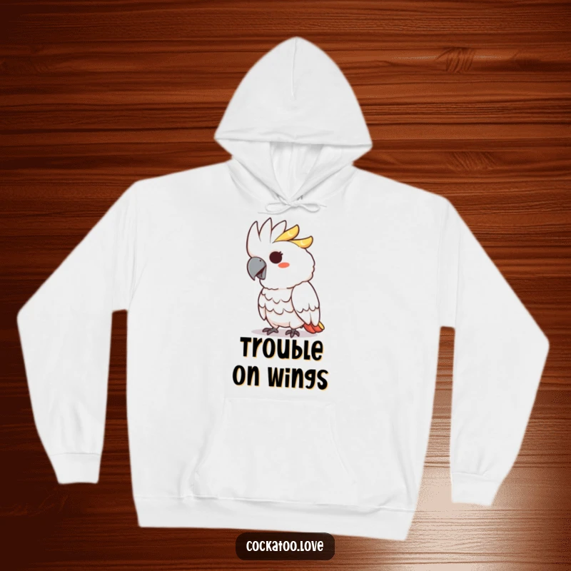 Funny hoodie featuring a cockatoo character with a mischievous grin playfully pecking, perfect for cozy mischief.